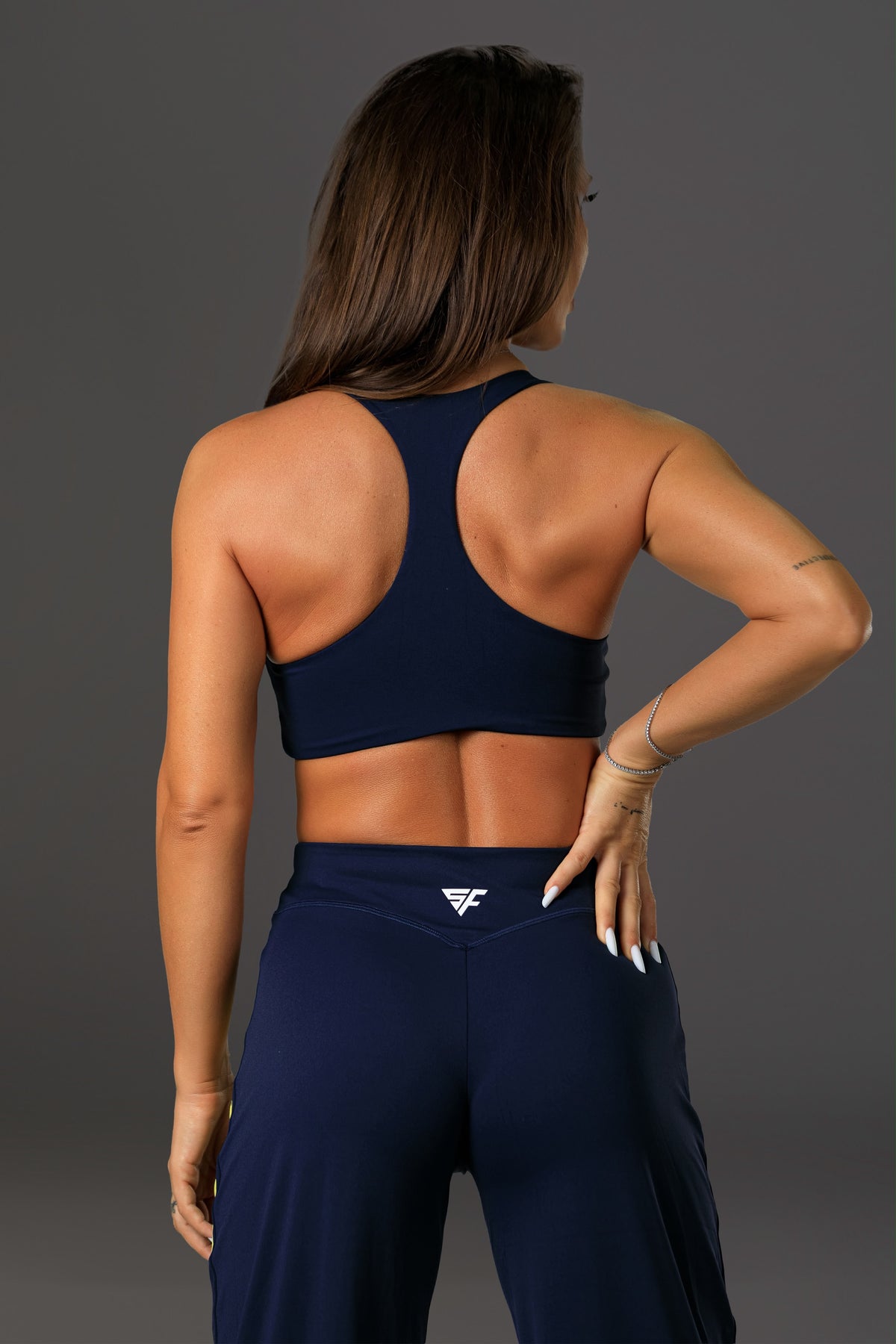 Set dama sport evazat Ynaia (top+pantalon) maro